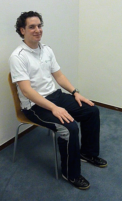 Rechthoek Beter Implementeren Oefening 4 - Aanspannen terwijl u op de stoel zit